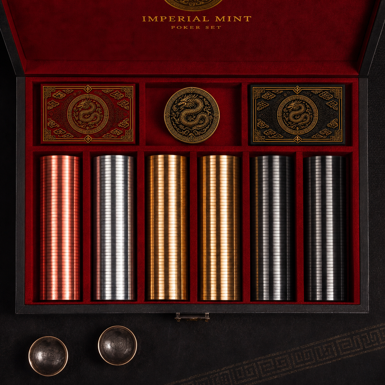 Deck and Dynasty Imperial Mint luxury metal poker chip set top-down view with dragon chips, cards, and dealer button